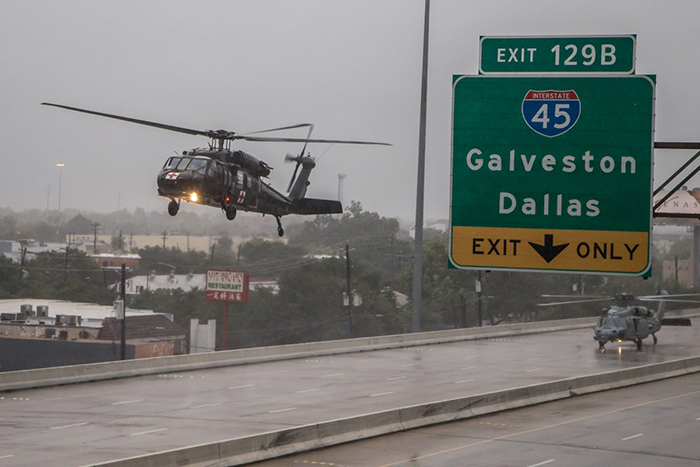 Inundated Houston highways have become landing pads and boat launches.